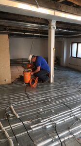 Underfloor heating retrofit for energy-efficient home improvements
