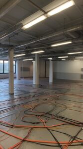 Energy-efficient commercial underfloor heating installation for businesses