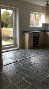Underfloor heating system for kitchens providing even heat distribution