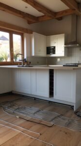 Comfortable heated kitchen floors using underfloor heating